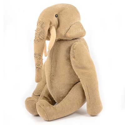 Lot 295 - An early 20th century toy straw filled elephant, possibly by Steiff