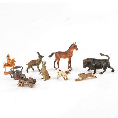 Lot 257 - A collection of small cold painted animals, and charms