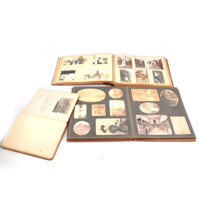 Lot 130 - Two early 20th century photo albums and an autograph book.