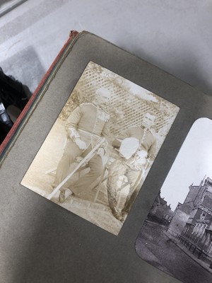 Lot 130 - Two early 20th century photo albums and an autograph book.