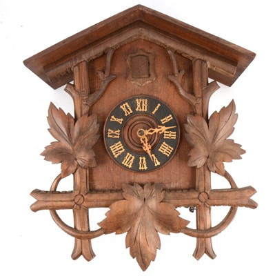 Lot 162 - Stained and carved wood cuckoo clock