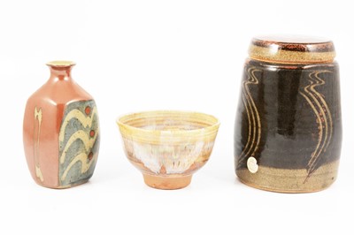 Lot 1037 - David Frith, a stoneware vase; a Ray Finch footed bowl, and another jar and cover.
