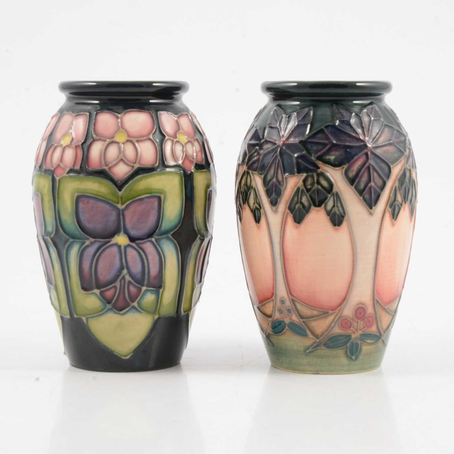 Lot 1 - Moorcroft Pottery, 'Cluny' and 'Violets' vases, designed by Sally Tuffin, 1993.