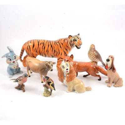 Lot 23 - Beswick tiger and other animals and birds, and Wade Disney blow-ups.