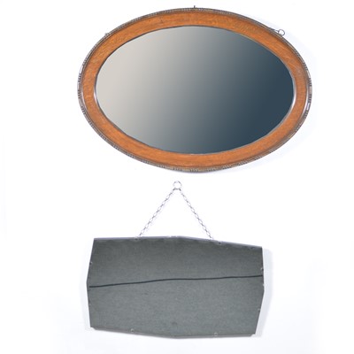 Lot 499 - Oak framed wall mirror and a bevelled edge wall mirror