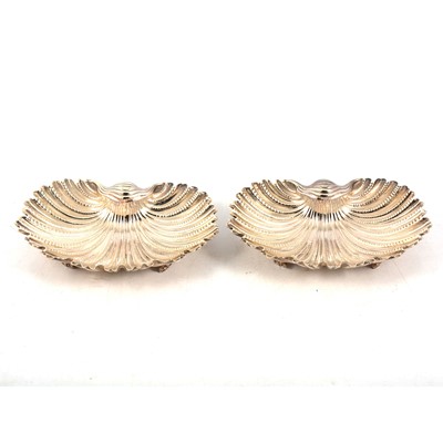 Lot 28 - Pair of Italian sterling silver scallop-shape oyster dishes, Gianmaria Buccellati