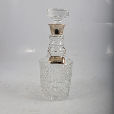 Lot 241 - Cut-glass mallet-shape decanter with silver collar, BP Co., London 1984.