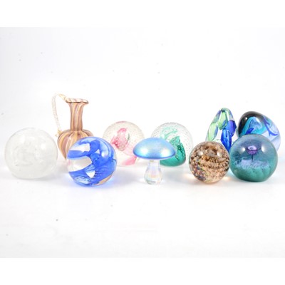 Lot 17 - Nine Caithness and other glass paperweights, and a Murano glass vase.