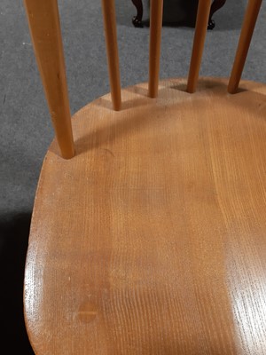 Lot 489 - Ercol dining table and chairs