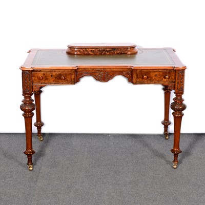 Lot 323 - Victorian figured walnut writing table