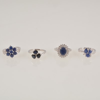 Lot 276 - Gemporia - Four sapphire and white zircon rings.