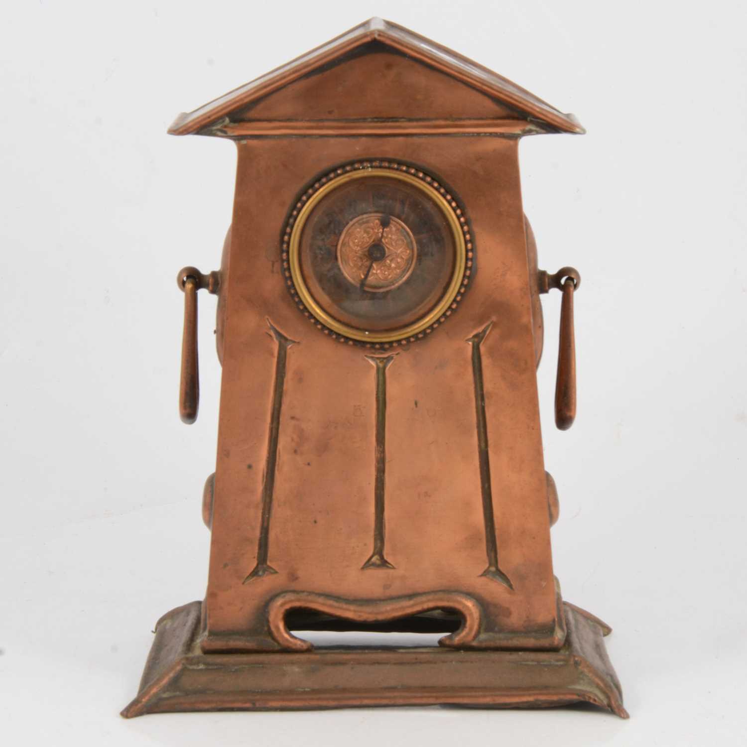 Lot 117 - Arts & Crafts copper mantle clock