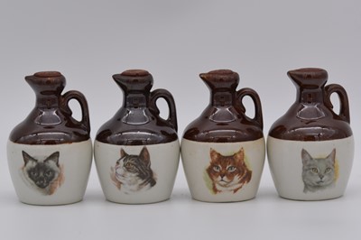 Lot 107 - Sixteen assorted Rutherford's ceramic decanters, Cat series