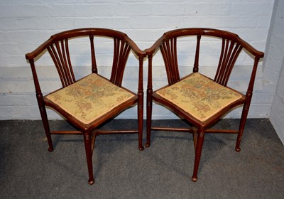 Lot 587 - Pair of Edwardian oak corner chairs.