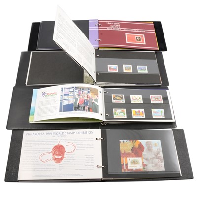 Lot 152 - Fourteen Guernsey Post Office binders containing mint stamp sets.