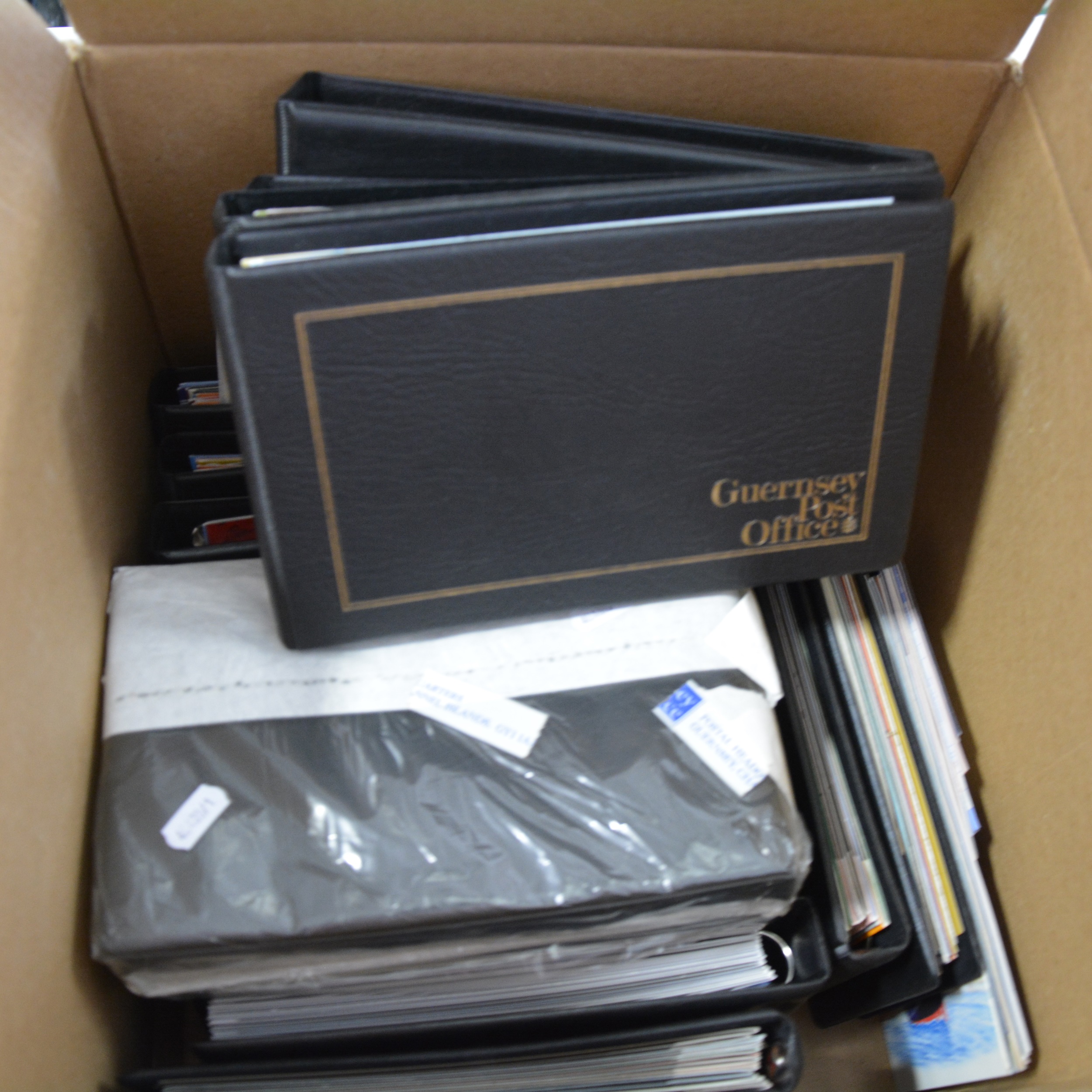 Lot 152 Fourteen Guernsey Post Office binders