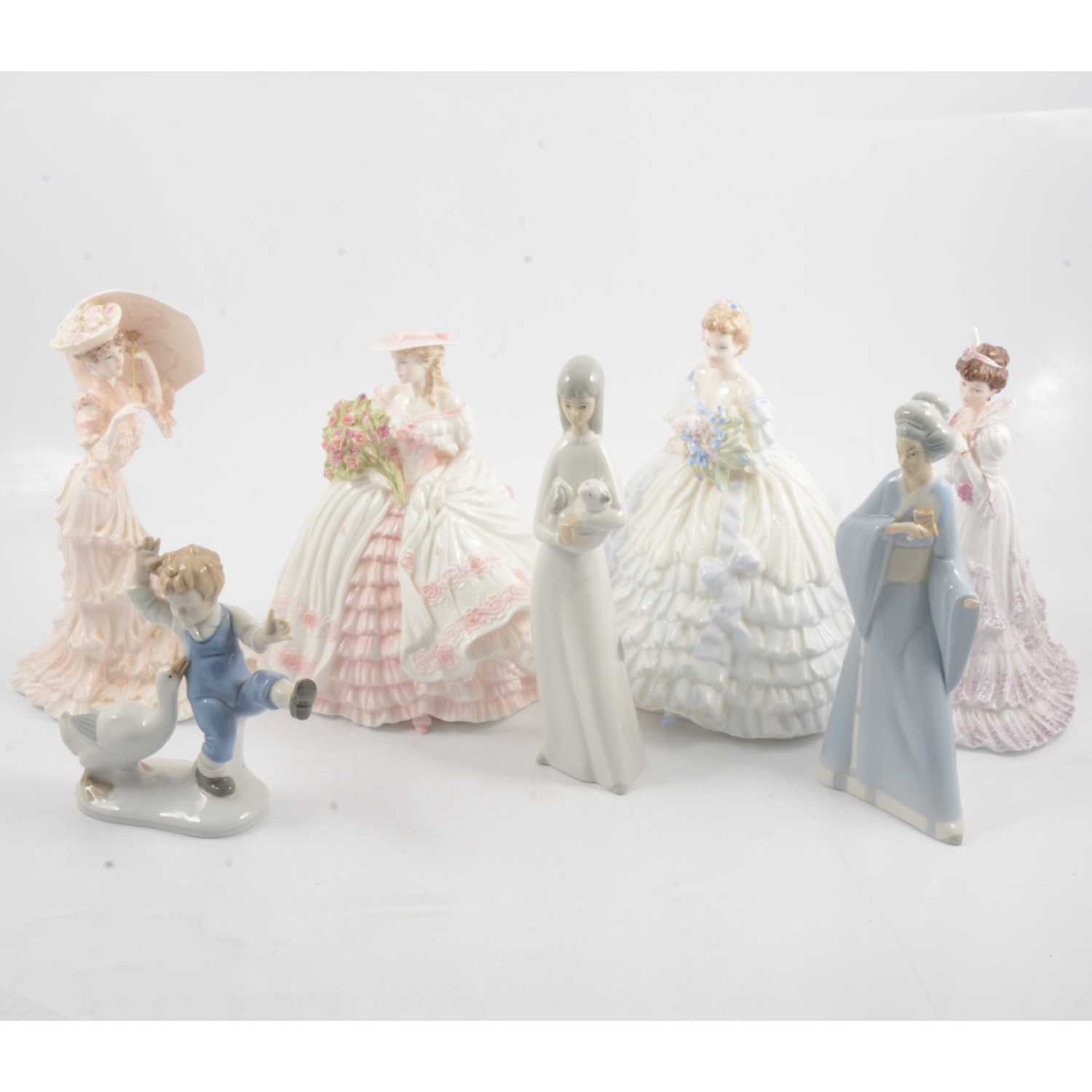 Lot 21 - A collection of seven figurines