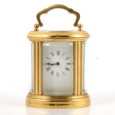 Lot 118 - Small brass carriage clock