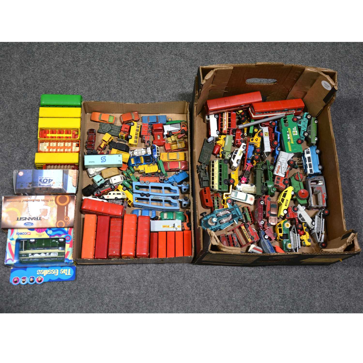 Lot 145 - Two trays of die-cast model vehicles and cars