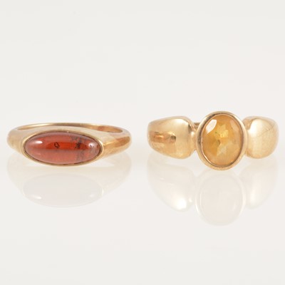 Lot 241 - Two modern 9 carat gold stone set dress rings.