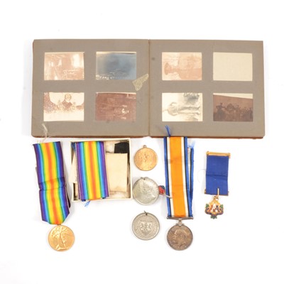 Lot 272 - Medals: WW1 pairs, Royal commemoratives, YMCA badges and a photograph album.