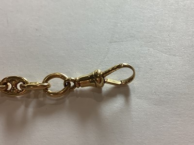 Lot 103 - An 18 carat yellow gold double Albert watch chain.