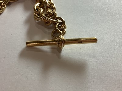 Lot 103 - An 18 carat yellow gold double Albert watch chain.