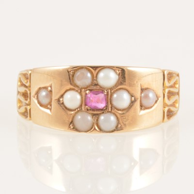 Lot 243 - A Victorian 15 carat gold seed pearl ring.