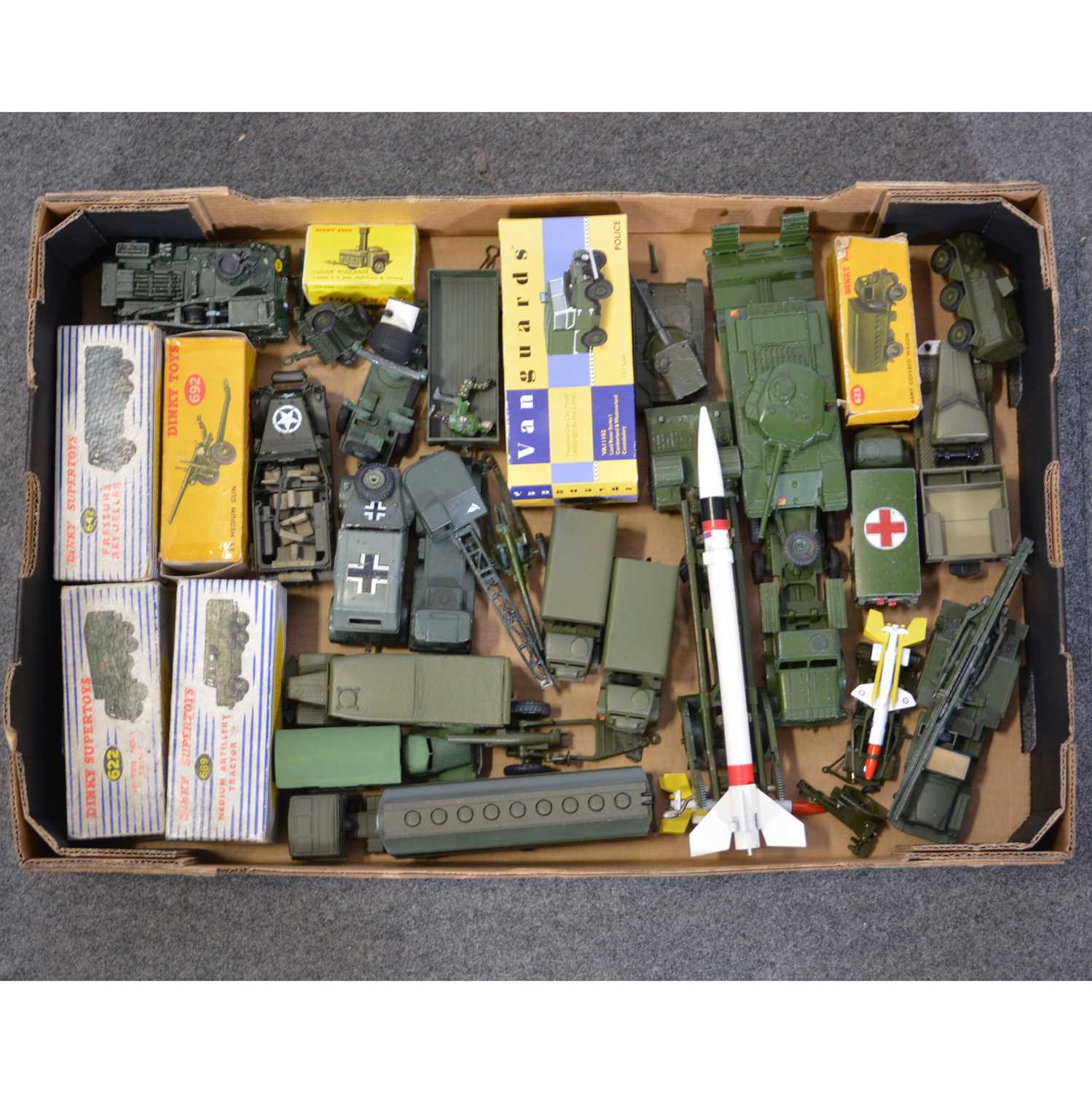 Lot 144 - One tray of boxed and loose military models; including Dinky Toys 922 10-ton Army truck