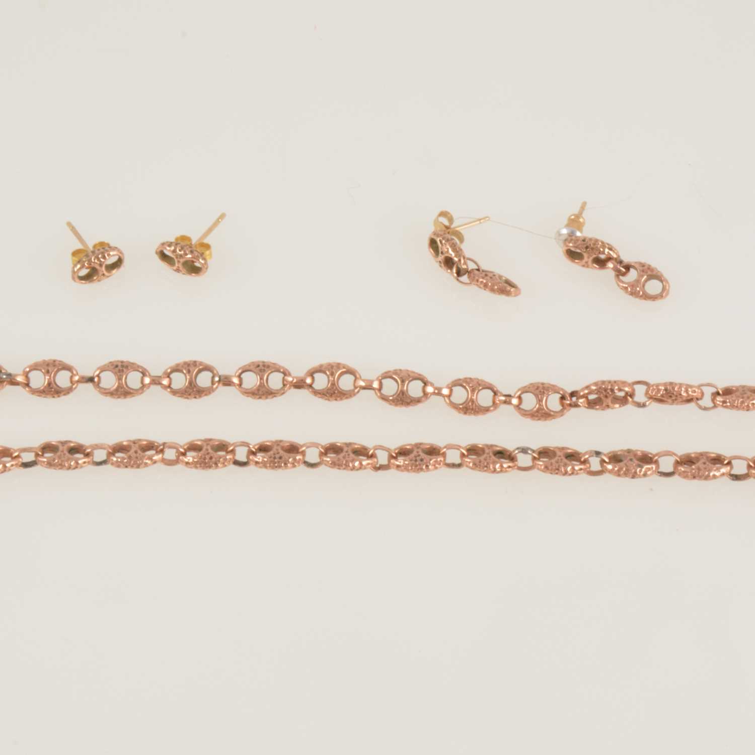 Lot 269 - A 9 carat rose gold chain necklace and two pairs of earrings.