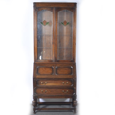 Lot 481 - 1940s oak bureau bookcase