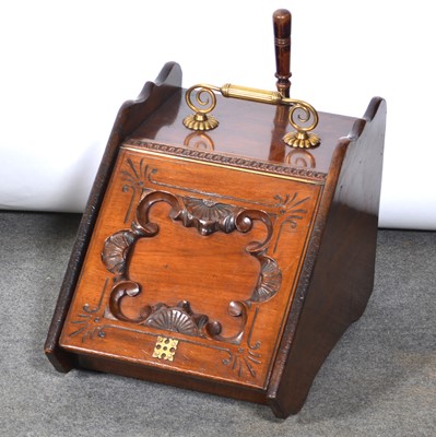 Lot 526 - A mahogany slope front coal scuttle with liner and brass shovel.