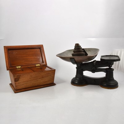 Lot 112 - Mahogany tea caddy, set of vintage scales and weights