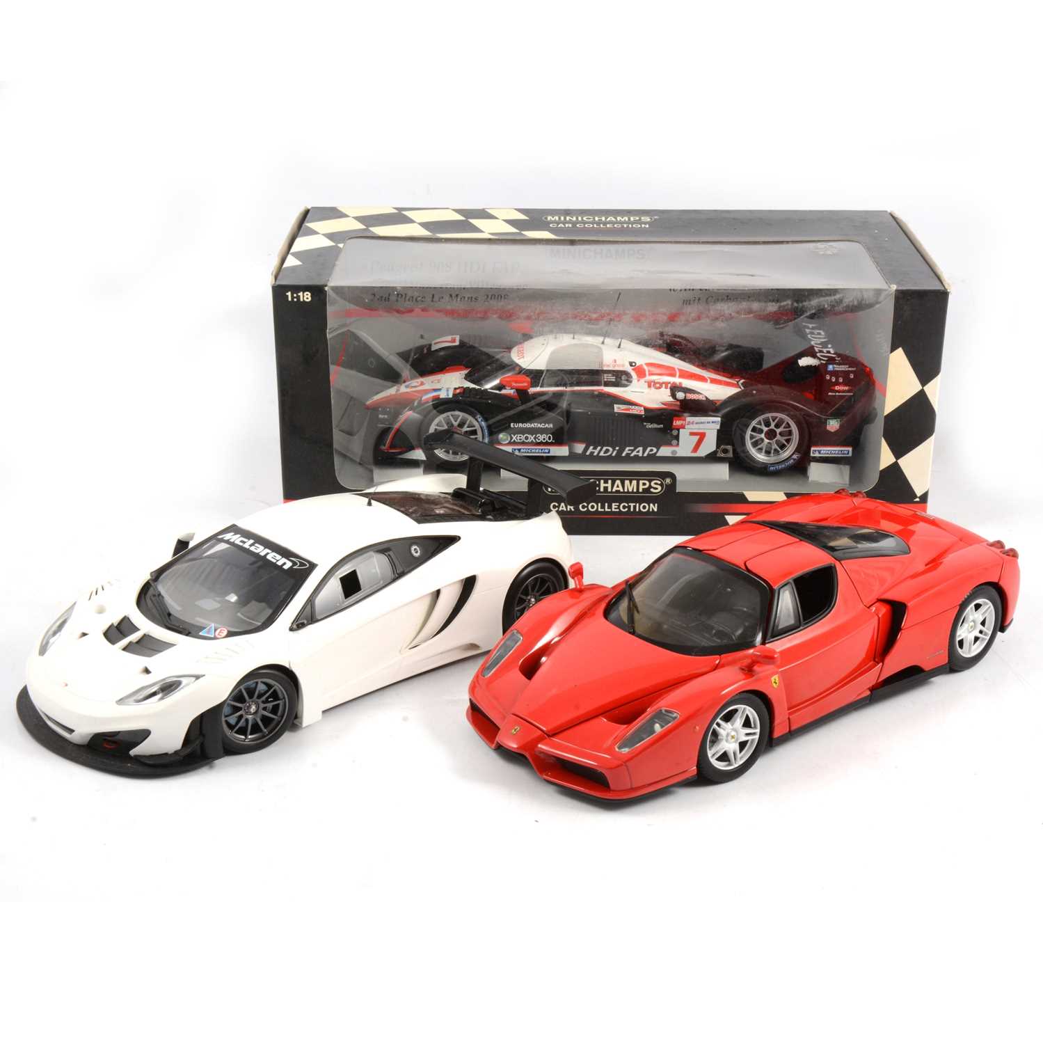 Lot 190 - Three 1:18 scale model racing cars including Minichamps Peugeot 908 HDI FAP, boxed