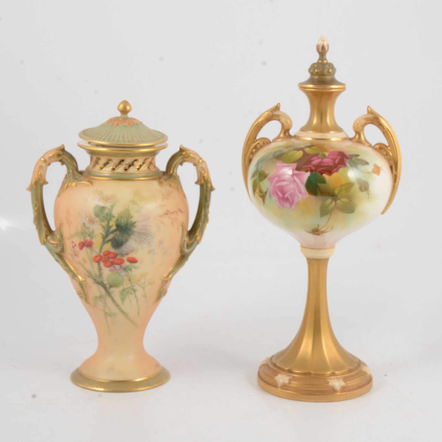Lot 73 - Two Royal Worcester blush ivory vases and covers