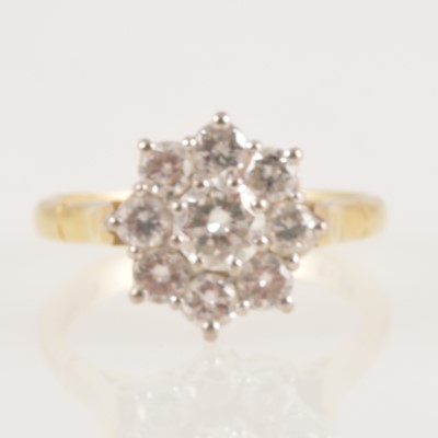 Lot 230 - A diamond cluster ring.