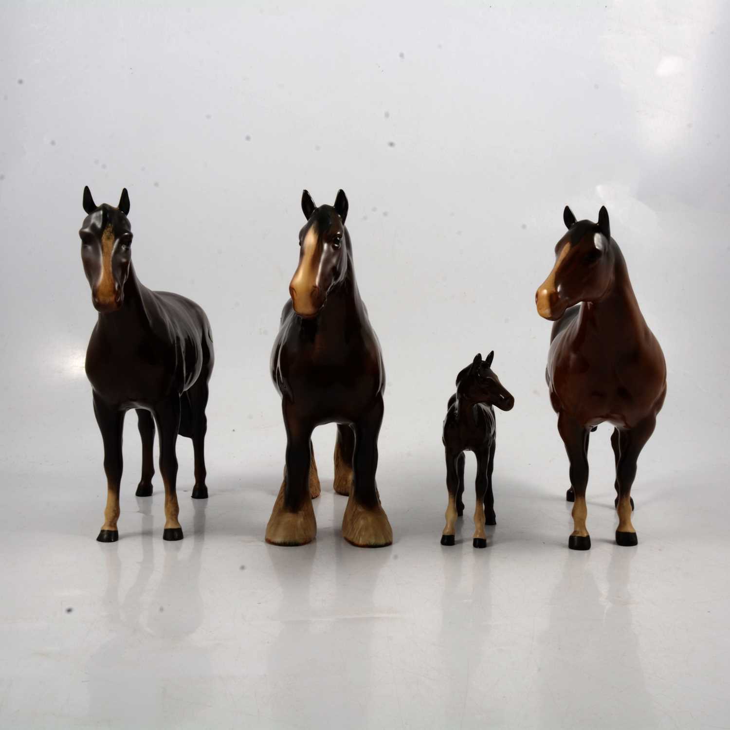 Lot 24 - Three Beswick horses and a Royal Doulton foal.
