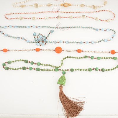 Lot 301 - Five pressed opaque glass sautoirs and necklaces, circa 1920's 1930's