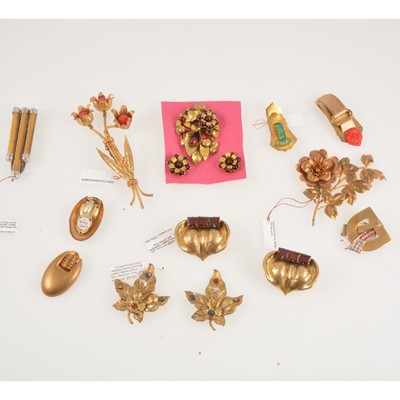 Lot 297 - Ten vintage gilt metal brooches and dress clips.