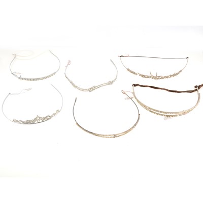 Lot 309 - Six paste set tiara style headbands, circa 1920's 1930's.