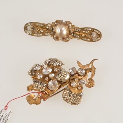 Lot 306 - Miriam Haskell - a signed diamante and simulated seed pearl brooch and a bar brooch.