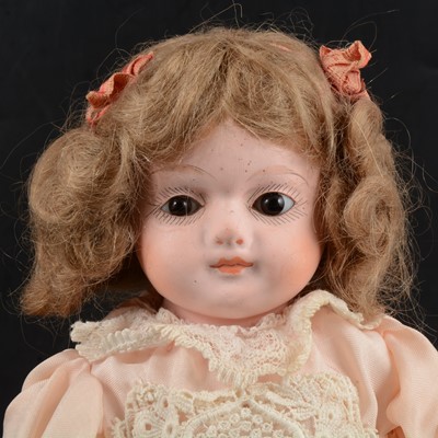 Lot 311 - A Victorian bisque head doll, unmarked, fixed eyes, closed mouth