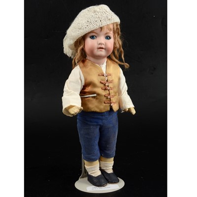 Lot 324 - Heubach Koppelsdorf, Germany, bisque head boy doll, 320 4/0 head stamp.