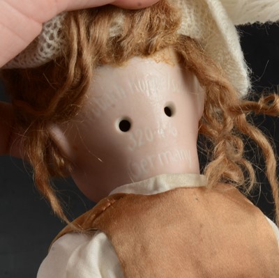 Lot 324 - Heubach Koppelsdorf, Germany, bisque head boy doll, 320 4/0 head stamp.
