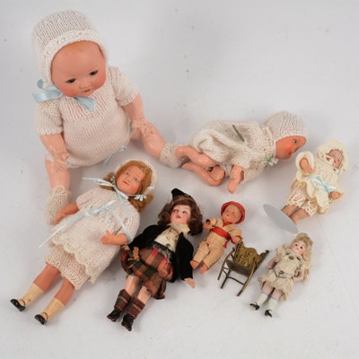 Lot 338 - Seven miniature and baby dolls; including Armand Marseille