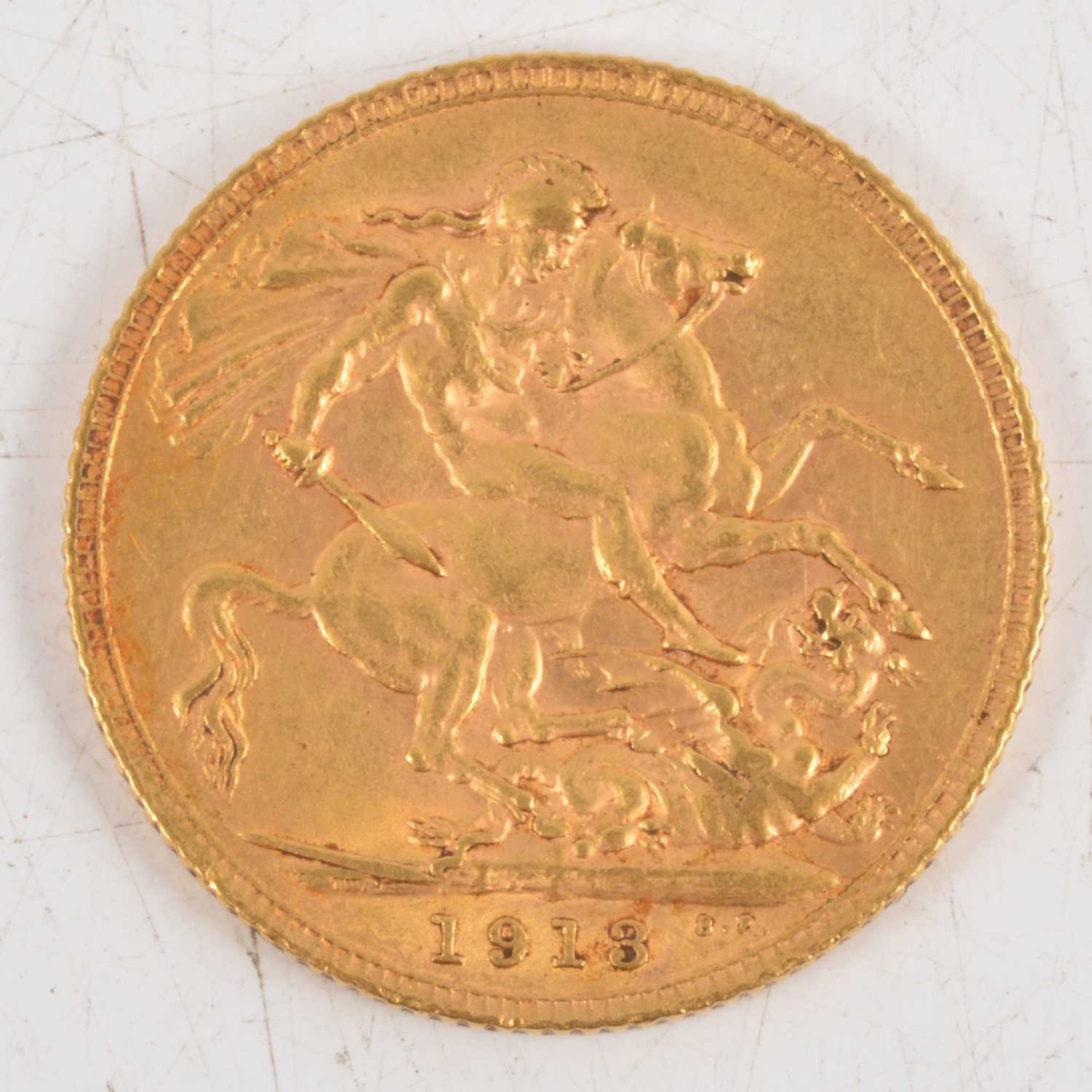 Lot 212 - George V gold Sovereign coin, 1913, 8g.