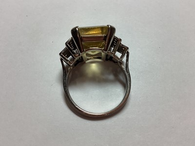 Lot 39 - A lady's large citrine and diamond dress ring.
