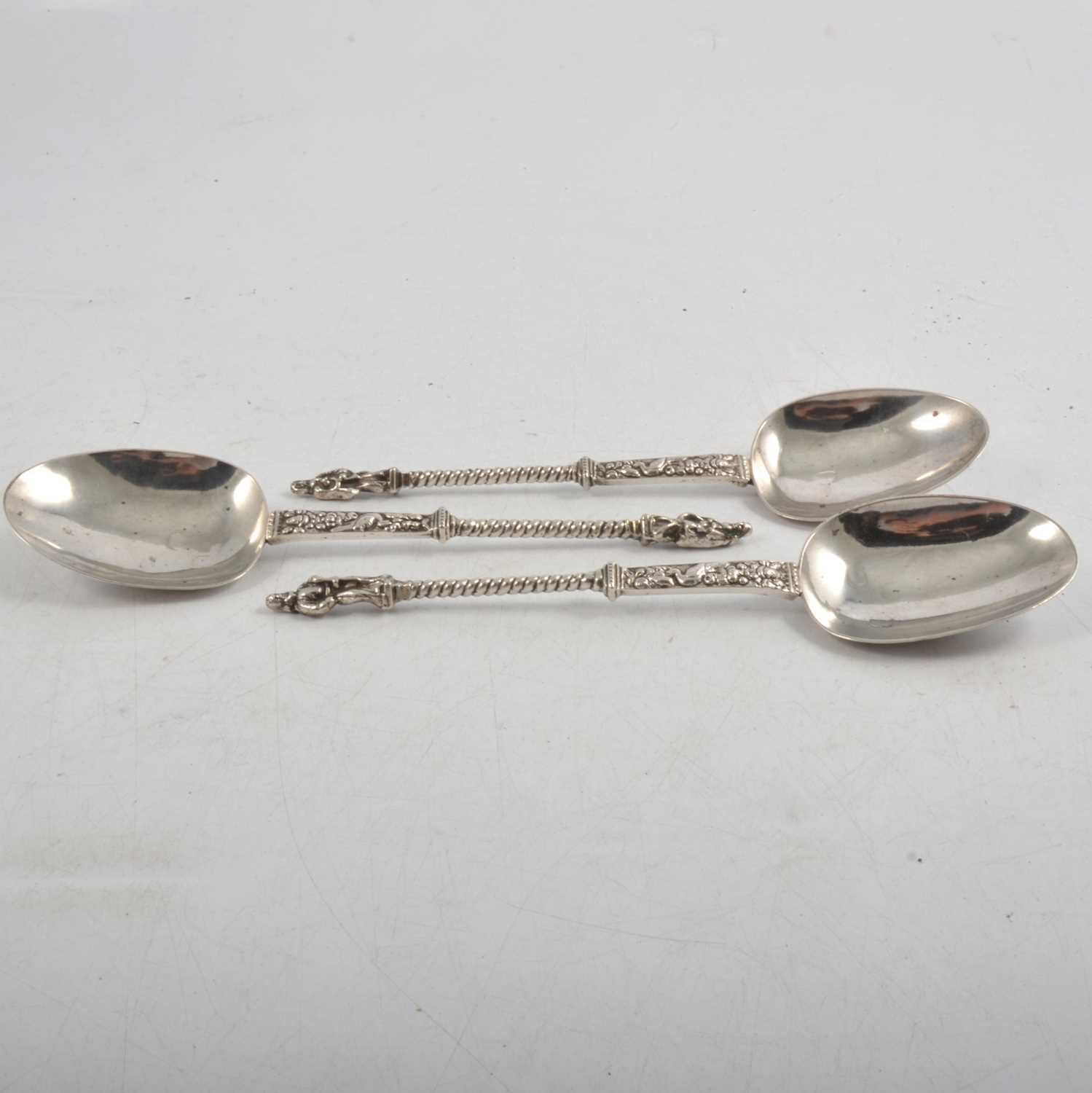 Lot 284 - Three white metal Apostle spoons.