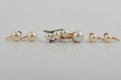Lot 278 - Two cultured pearl dress rings and two pairs of cultured pearl earscrews.
