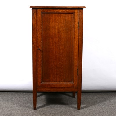 Lot 469 - Oak music cabinet